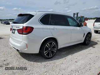2016 BMW X5 M z VIN 5YMKT6C50G0R78980, wystawiony jako Copart lot #45171984 z przebiegiem 74 593 mil mil oraz . Historia ofert i sprzedaży dostępna na DreamBid. Obrazek 3.