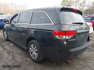 2016 Honda Odyssey SE with VIN 5FNRL5H39GB155488, listed as a IAAI auction lot 41702336 with 122,164 mi miles. Bid and sale history available at carsss.com. Image 3.