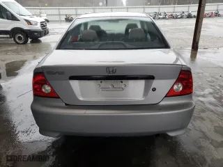 2004 Honda Civic VP with VIN 1HGEM22174L009666, listed as a Copart auction lot 44517995 with 176,910 mi miles and Clean Title. Bid and sale history available at carsss.com. Image 6.