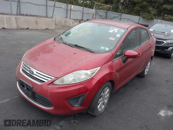 2012 Ford Fiesta SE with VIN 3FADP4BJ1CM145114, listed as a IAAI auction lot 40446295 with 169,529 mi miles. Bid and sale history available at carsss.com. Image 2.