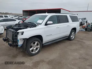 2015 Chevrolet Suburban LT with VIN 1GNSKJKC7FR547276, listed as a IAAI auction lot 42041289 with 189,075 mi miles and . Bid and sale history available at DreamBid. Image 23.