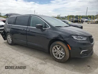 2023 Chrysler Pacifica Touring L with VIN 2C4RC1BG4PR621126, listed as a Copart auction lot 56694085 with 42,659 mi miles and Salvage title. Bid and sale history available at DreamBid. Image 4.