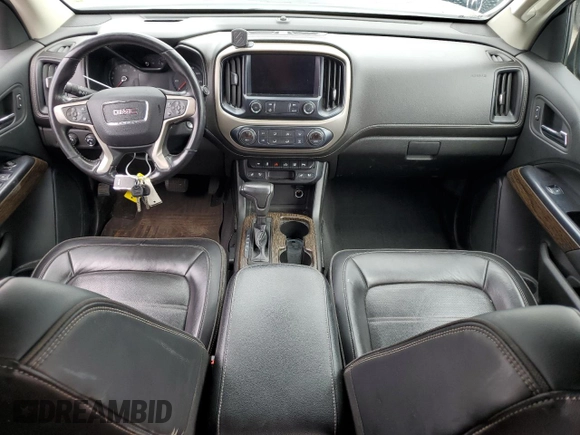 2020 GMC Canyon 4WD Denali with VIN 1GTG6EEN0L1243031, listed as a Copart auction lot 67939014 with 106,294 mi miles and Salvage Title. Bid and sale history available at carsss.com. Image 8.
