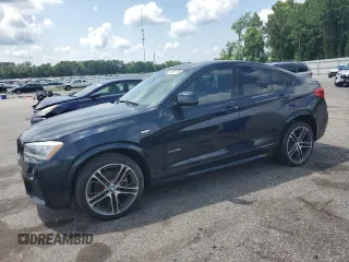 2015 BMW X4 xDrive28i with VIN 5UXXW3C59F0M88412, listed as a Copart auction lot 64091715 with 169,778 mi miles and Clean title. Bid and sale history available at DreamBid. Image 1.
