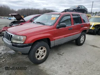 2002 Jeep Grand Cherokee with VIN 1J8GX38S92C176329, listed as a Copart auction lot 47885635 with 154,167 mi miles and Salvage title. Bid and sale history available at DreamBid. Image 1.