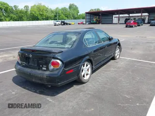 2002 Nissan Maxima GLE z VIN JN1DA31AX2T325038, wystawiony jako IAAI lot #42250279 z przebiegiem 169 555 mil mil oraz . Historia ofert i sprzedaży dostępna na DreamBid. Obrazek 4.
