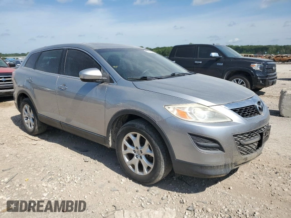 2012 Mazda CX-9 Touring with VIN JM3TB2CA3C0333151, listed as a Copart auction lot 64241395 with 131,466 mi miles and Salvage title. Bid and sale history available at DreamBid. Image 4.