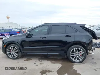 2021 Cadillac XT4 FWD Sport with VIN 1GYFZER40MF039140, listed as a IAAI auction lot 41287513 with 51,725 mi miles and . Bid and sale history available at DreamBid. Image 15.