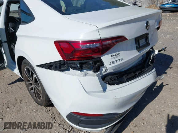 2023 Volkswagen Jetta Sport z VIN 3VWBM7BU2PM034287, wystawiony jako IAAI lot #41742935 z przebiegiem 32 818 mil mil oraz . Historia ofert i sprzedaży dostępna na DreamBid. Obrazek 17.