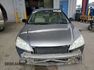 2004 Honda Civic LX with VIN 1HGEM22594L011650, listed as a Copart auction lot 52419245 with 84,375 mi miles and Clean Title. Bid and sale history available at DreamBid. Image 5.