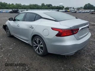 2018 Nissan Maxima SV with VIN 1N4AA6APXJC380082, listed as a Copart auction lot 61170815 with 98,008 mi miles and Salvage title. Bid and sale history available at DreamBid. Image 2.