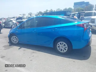 2021 Toyota Prius L Eco with VIN JTDKAMFUXM3134462, listed as a IAAI auction lot 42450931 with 89,239 mi miles and . Bid and sale history available at DreamBid. Image 14.