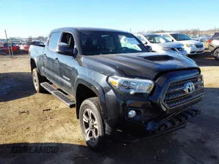 2016 Toyota Tacoma SR5 with VIN 5TFDZ5BN6GX005816, listed as a IAAI auction lot 41641500 with 87,231 mi miles. Bid and sale history available at carsss.com. Image 1.