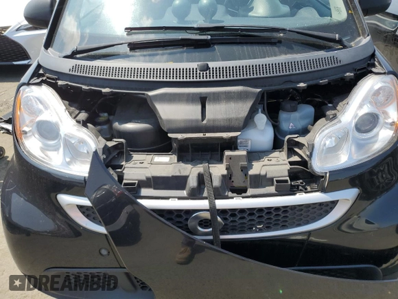 2014 Smart fortwo Passion z VIN WMEEJ9AA0EK788192, wystawiony jako Copart lot #68584984 z przebiegiem Nie podano mil oraz Szkoda całkowita • Salvage title. Historia ofert i sprzedaży dostępna na DreamBid. Obrazek 11.