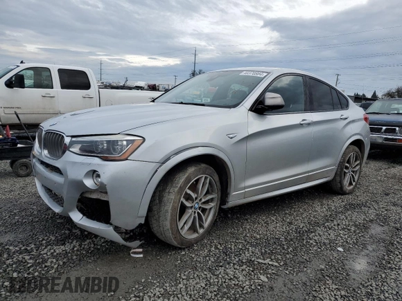 2017 BMW X4 M40i with VIN 5UXXW7C57H0U25268, listed as a Copart auction lot 40370884 with 99,387 mi miles. Bid and sale history available at carsss.com. Image 1.