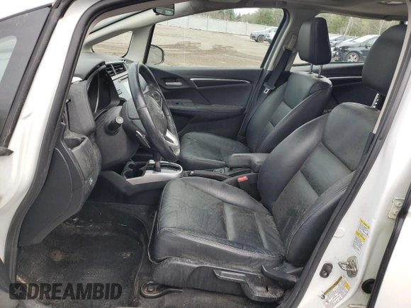 2015 Honda Fit EX-L z VIN 3HGGK5H84FM107978, wystawiony jako Copart lot #54879335 z przebiegiem 193 583 mil mil oraz Nie do naprawy • Non repairable. Historia ofert i sprzedaży dostępna na DreamBid. Obrazek 7.