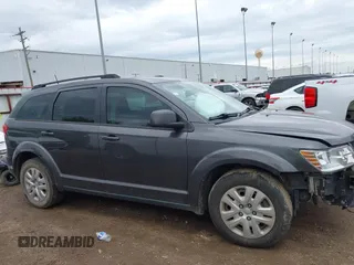 2020 Dodge Journey SE Value z VIN 3C4PDCAB2LT202088, wystawiony jako IAAI lot #41894515 z przebiegiem 97 564 mil mil oraz . Historia ofert i sprzedaży dostępna na DreamBid. Obrazek 13.
