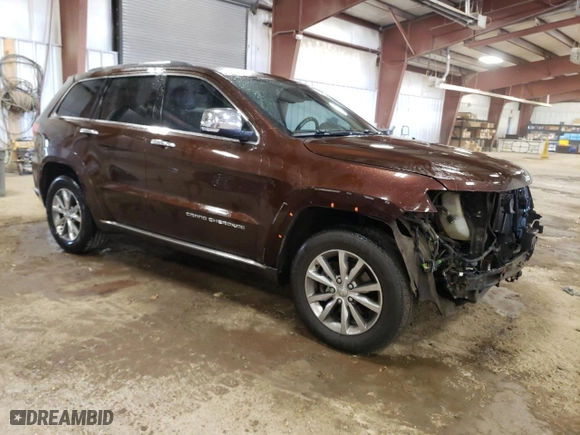 2014 Jeep Grand Cherokee Summit with VIN 1C4RJFJG2EC404605, listed as a Copart auction lot 52082335 with 157,220 mi miles and Clean Title. Bid and sale history available at carsss.com. Image 4.