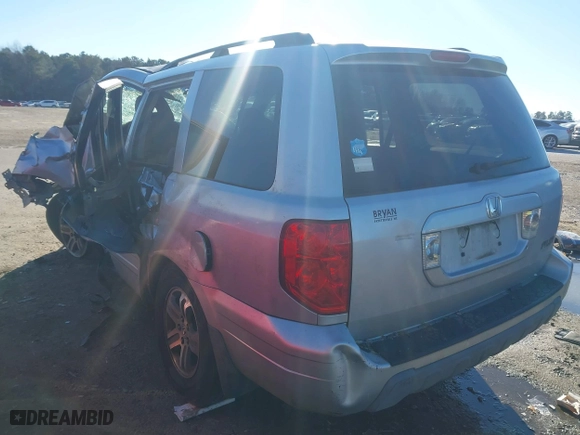 2004 Honda Pilot EX with VIN 2HKYF18464H512952, listed as a IAAI auction lot 41373720 with 306,406 mi miles. Bid and sale history available at carsss.com. Image 3.