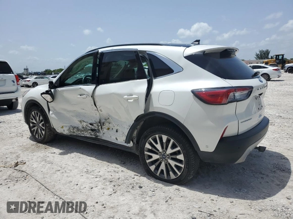 2020 Ford Escape Titanium Hybrid with VIN 1FMCU9DZ0LUB95931, listed as a Copart auction lot 59876815 with 67,932 mi miles and Salvage title. Bid and sale history available at DreamBid. Image 2.