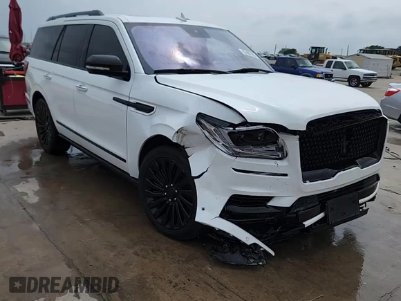 2020 Lincoln Navigator Reserve with VIN 5LMJJ2LTXLEL01023, listed as a Copart auction lot 57403185 with 116,215 mi miles and Salvage title. Bid and sale history available at DreamBid. Image 14.