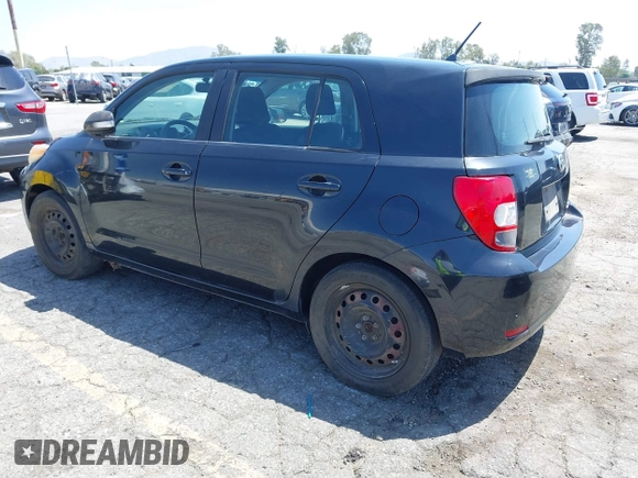 2008 Scion xD with VIN JTKKU10438J014799, listed as a IAAI auction lot 42107563 with 215,136 mi miles. Bid and sale history available at carsss.com. Image 3.