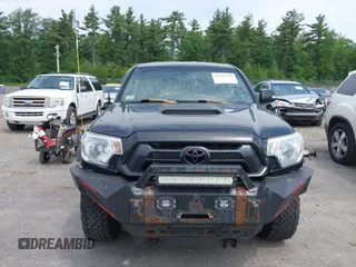 2013 Toyota Tacoma with VIN 3TMLU4EN4DM117239, listed as a IAAI auction lot 42494359 with 239,635 mi miles and . Bid and sale history available at DreamBid. Image 13.