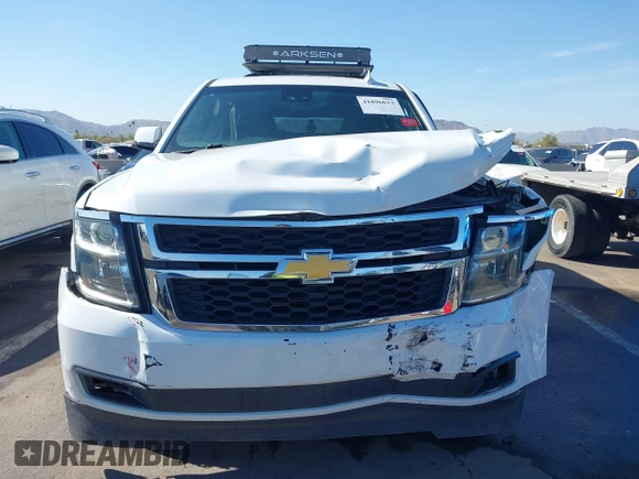 2019 Chevrolet Suburban LT with VIN 1GNSCHKC3KR143942, listed as a IAAI auction lot 41896633 with 153,139 mi miles and . Bid and sale history available at DreamBid. Image 12.