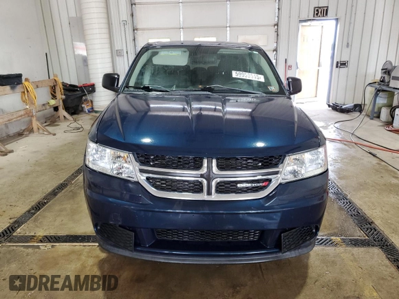 2013 Dodge Journey American Value with VIN 3C4PDCAB4DT581984, listed as a Copart auction lot 59953515 with 166,927 mi miles and Salvage title. Bid and sale history available at DreamBid. Image 5.