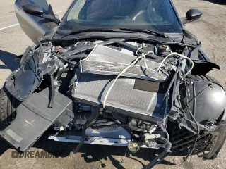 2018 Aston Martin DB11 z VIN SCFRMFAV1JGL05008, wystawiony jako Copart lot #77024394 z przebiegiem Nie podano mil oraz Szkody całkowita. Historia ofert i sprzedaży dostępna na DreamBid. Obrazek 11.