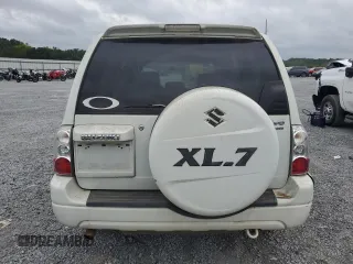 2005 Suzuki XL7 LX z VIN JS3TX92V254105078, wystawiony jako Copart lot #69820194 z przebiegiem 224 805 mil mil oraz Szkoda całkowita • Salvage title. Historia ofert i sprzedaży dostępna na DreamBid. Obrazek 6.