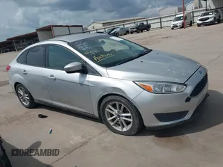 2018 Ford Focus SE with VIN 1FADP3F20JL225287, listed as a IAAI auction lot 42732716 with 140,898 mi miles and . Bid and sale history available at DreamBid. Image 1.