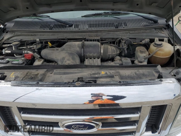 2012 Ford Econoline Passenger XL with VIN 1FBSS3BL3CDA97191, listed as a Copart auction lot 55284565 with 282,195 mi miles and Salvage title. Bid and sale history available at DreamBid. Image 12.