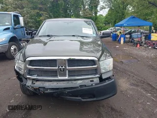 2012 Ram 1500 Big Horn z VIN 1C6RD7GT7CS154905, wystawiony jako IAAI lot #42267549 z przebiegiem 251 589 mil mil oraz . Historia ofert i sprzedaży dostępna na DreamBid. Obrazek 12.