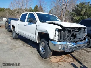 2017 Chevrolet Silverado 1500 LT with VIN 3GCUKREC6HG464324, listed as a IAAI auction lot 41464507 with 100,801 mi miles. Bid and sale history available at carsss.com. Image 1.