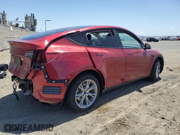 2024 Tesla Model Y Long Range with VIN 7SAYGDEE8RA233147, listed as a Copart auction lot 56695545 with 9,512 mi miles and Salvage title. Bid and sale history available at DreamBid. Image 3.