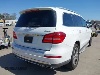 2018 Mercedes-Benz GLS 450 with VIN 4JGDF6EE6JB132415, listed as a IAAI auction lot 42283484 with 54,090 mi miles and . Bid and sale history available at DreamBid. Image 4.