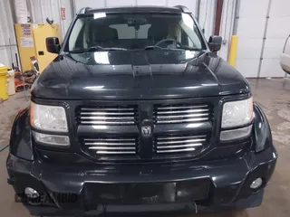 2011 Dodge Nitro Heat with VIN 1D4PU4GK1BW602572, listed as a IAAI auction lot 41529030 with 134,482 mi miles. Bid and sale history available at carsss.com. Image 12.