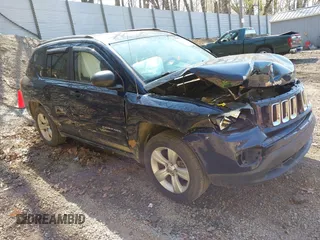 2016 Jeep Compass Sport with VIN 1C4NJDBB5GD521159, listed as a IAAI auction lot 42101971 with 86,217 mi miles. Bid and sale history available at carsss.com. Image 1.
