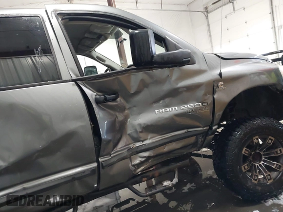2006 Dodge 2500 SLT with VIN 1D7KS28C06J214959, listed as a IAAI auction lot 41125689 with 245,429 mi miles and . Bid and sale history available at DreamBid. Image 18.