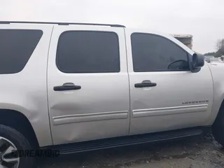 2010 Chevrolet Suburban LS with VIN 1GNUKHE37AR193670, listed as a IAAI auction lot 41415863 with 213,371 mi miles and . Bid and sale history available at DreamBid. Image 12.