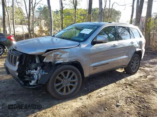 2016 Jeep Grand Cherokee Limited 75th Anniversary with VIN 1C4RJFBT9GC400873, listed as a IAAI auction lot 41834112 with 110,457 mi miles and . Bid and sale history available at DreamBid. Image 17.