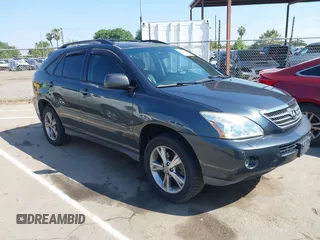 2006 Lexus RX 400h with VIN JTJHW31U560009707, listed as a IAAI auction lot 42148672 with 198,569 mi miles and . Bid and sale history available at DreamBid. Image 1.