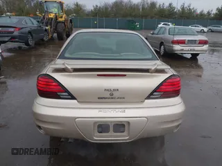 2003 Pontiac Grand Am SE1 with VIN 1G2NF52E03C327760, listed as a IAAI auction lot 41718054 with 156,173 mi miles. Bid and sale history available at carsss.com. Image 17.