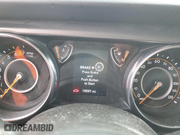 2023 Jeep Wrangler Sport with VIN 1C4HJXAG0PW595881, listed as a Copart auction lot 65590025 with 19,597 mi miles and Salvage title. Bid and sale history available at DreamBid. Image 9.