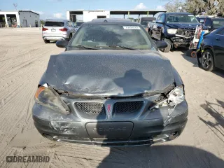 2004 Pontiac Grand Am SE2 with VIN 1G2NG52E34M586493, listed as a Copart auction lot 79894724 with 146,268 mi miles and Salvage Title. Bid and sale history available at carsss.com. Image 5.