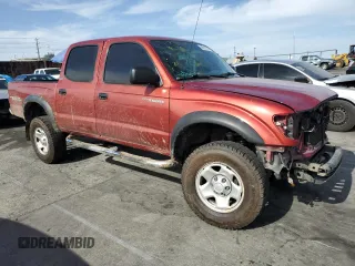 2003 Toyota Tacoma PreRunner with VIN 5TEGN92N13Z268024, listed as a Copart auction lot 56512375 with 333,073 mi miles and Salvage title. Bid and sale history available at DreamBid. Image 4.