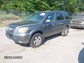 2007 Honda Pilot EX-L z VIN 2HKYF18677H504266, wystawiony jako IAAI lot #42467499 z przebiegiem 214 717 mil mil oraz . Historia ofert i sprzedaży dostępna na DreamBid. Obrazek 2.