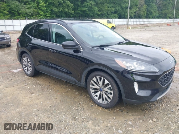 2021 Ford Escape Titanium Hybrid z VIN 1FMCU0DZ0MUA16798, wystawiony jako IAAI lot #42502086 z przebiegiem 107 250 mil mil oraz . Historia ofert i sprzedaży dostępna na DreamBid. Obrazek 1.