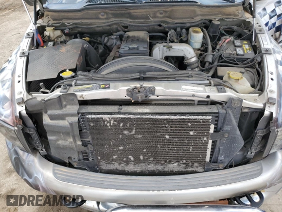 2005 Dodge 2500 SLT с VIN 3D7KS28C75G858085, выставлен на аукционе Copart как лот 54144345 с пробегом 265 815 миль миль и Списание • Salvage title. История ставок и продаж доступна на DreamBid. Изображение 11.